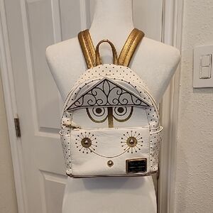 Disney Small World White and Gold Backpack